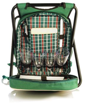 set for a picnic in a green backpack