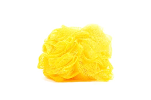yellow bath sponge or loufah, isolated on white