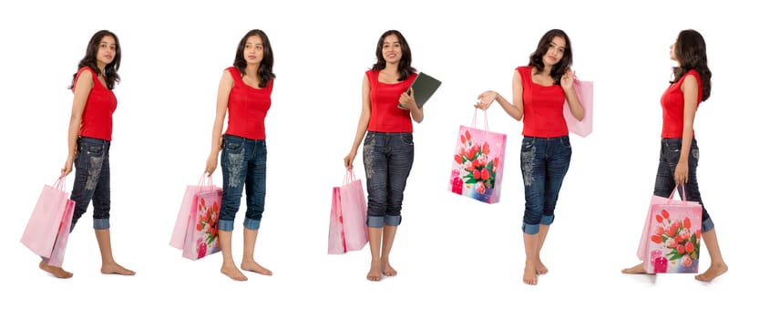 Lovely woman coming back from shopping isolated on white background