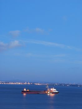 beautiful view of a container ship during sunset