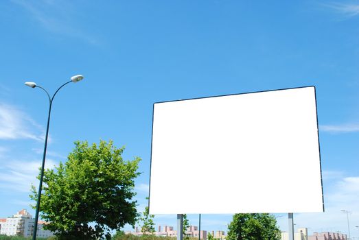 blank billboard announcement against blue sky background