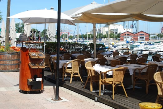 photo of a relaxing esplanade restaurant in a local marine