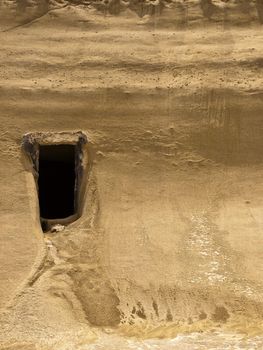 Cave dwelling carved into soft sandstone or limestone in Qbajjar in Gozo