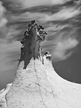 Wind erosion and electric energy might have given this sandstone rock in Qbajjar its peculiar shape