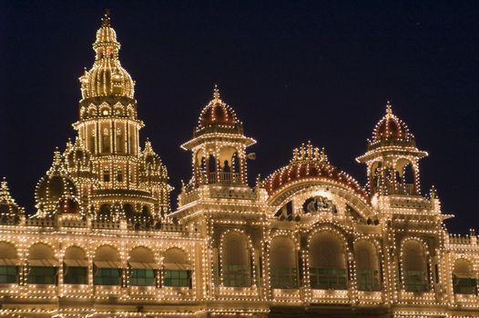 Mysore Palace illuminated by thousands of light-bulbs. Mysore, India