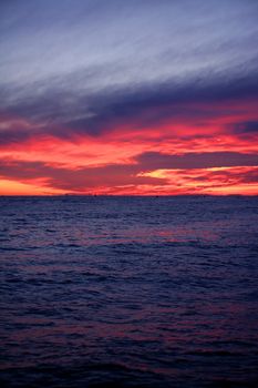 Red and blue sunrise in Mediterranean sea, Spain