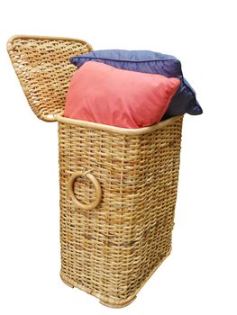 Two Cushions in a cane Hamper isolated with clipping path