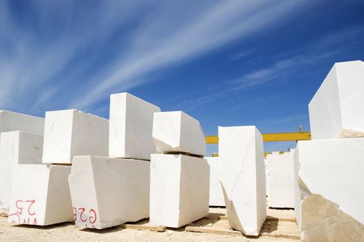 Marble blocks aligned in factory yard, Alentejo, Portugal