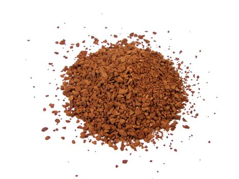 Instant coffee powder over the white background          