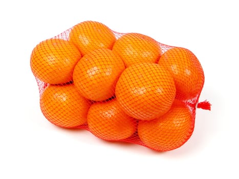 Oranges in net over white background          