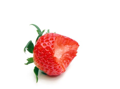 Strawberry with a bite missing          