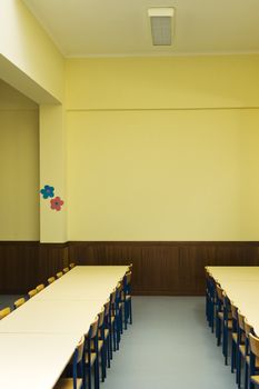 Schoolroom interior with chairs and tables