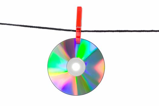 color cd on clothes line, isolated on white