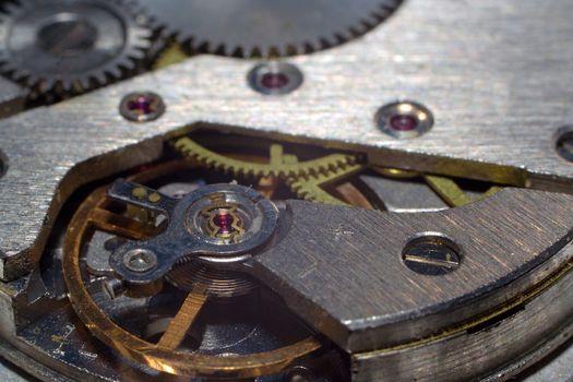 close-up part of clock mechanism