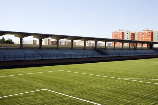 Seats in a empty soccer stadium