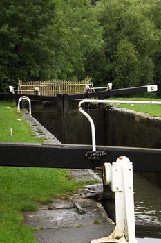 Gates and footbridge at one of the locks on the Kennet and Avon canal at Widcombe near Bath. The canal celebrates its bicentenary in 2010.
