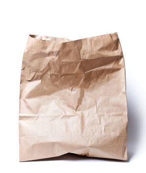 Isolated image of used brown paper bag made of recycled paper