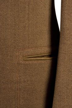 close-up of elegant suit, detail of cuff and pocket