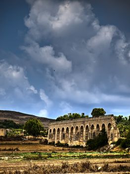 Part of a 19th century colonial aquaduct in Gozo now lying in ruins