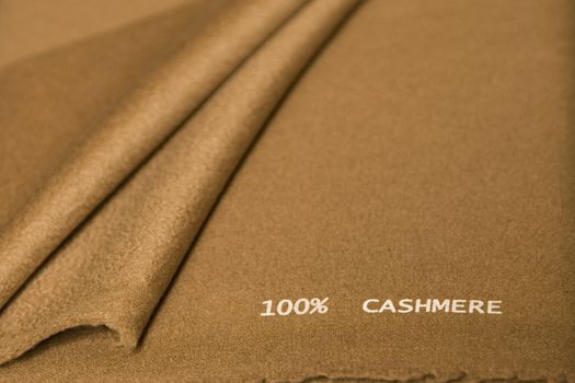 close-up of brown cashmere fabric, high quality textile