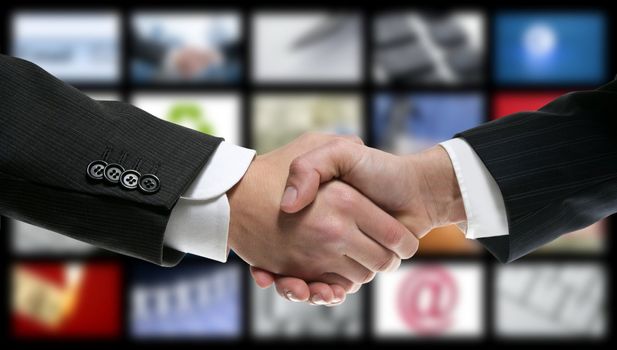 handshake over video tv screen technology and communication background