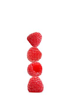 Delicious red raspberries on top of eachother