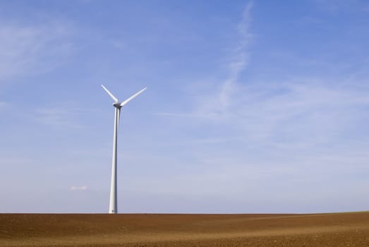 a wind turbine in a cultivated fields