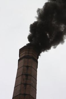 black smoke polluting the atmosphere often seen years gone by