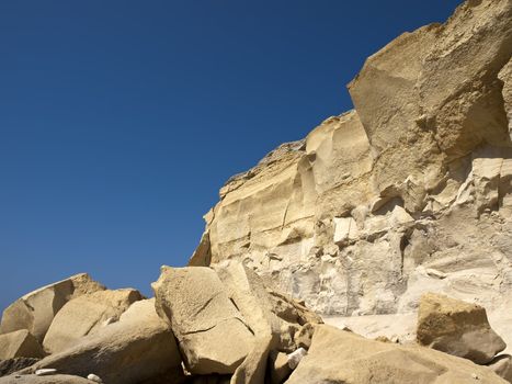 Beautiful and unique eroded sandstone cliff faces at Qbajjar in Gozo