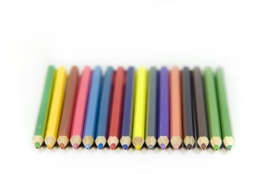 multicolored pencils on white