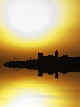 The Citadel in Gozo silhouetted by the setting sun