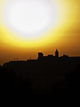 The Citadel in Gozo silhouetted by the setting sun