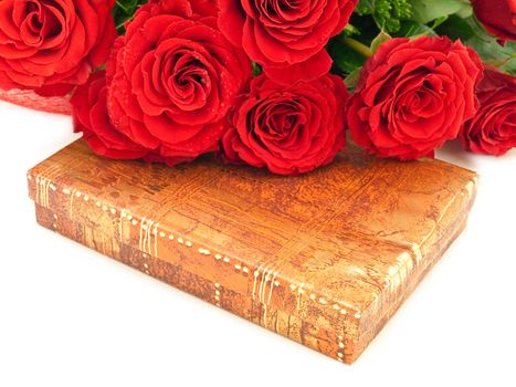 roses and gift against the white background