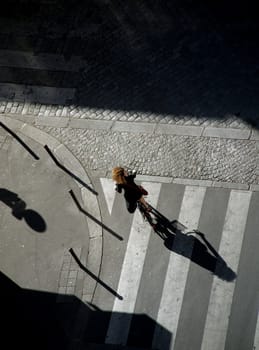 Girl riding bicycle in Paris.