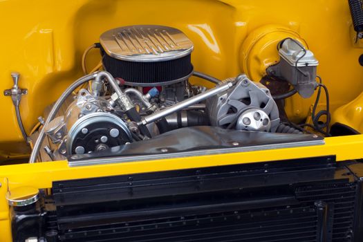 motor in a customized hot rod show car