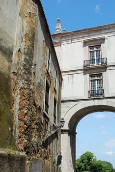 rusty building and beautiful cityscene in Lisbon's downtown