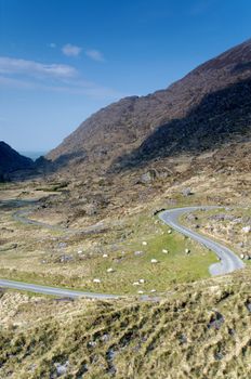 Road going down the valley heading to Gap of Dunloe, Ireland