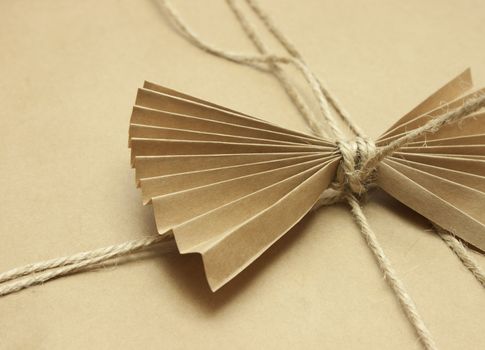 Vintage gift design with a paper bow