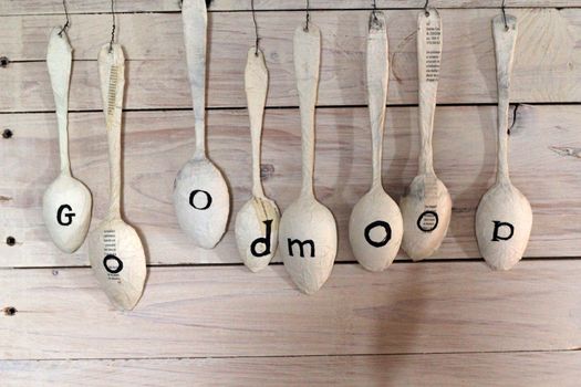 good mood written on papier mache spoons