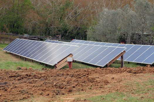 solar panels in a feild in tuscany