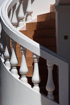 spiral white stairs outside on fresh air