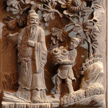 It is chinese god story stone carving.