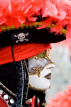 Carnival in venice with model dressed in various costumes and masks - pirate