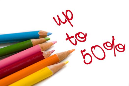 Set of color pencils with 50% off text, concept special sale or deal