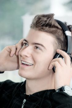 A young man listening to music