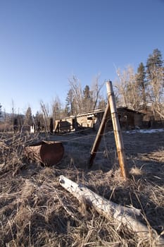 an old cabin barn that has been abandoned.