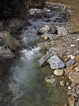 River run through the stones