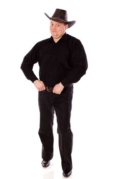 man wearing hat of cowboy standing isolated on white