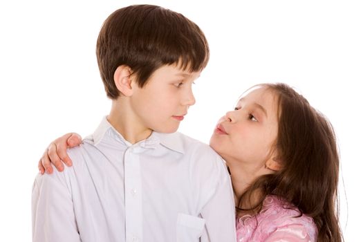 brother and sister posing together isolated on white