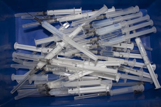 A container used syringes.